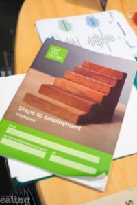 front cover of job club booklet on a table