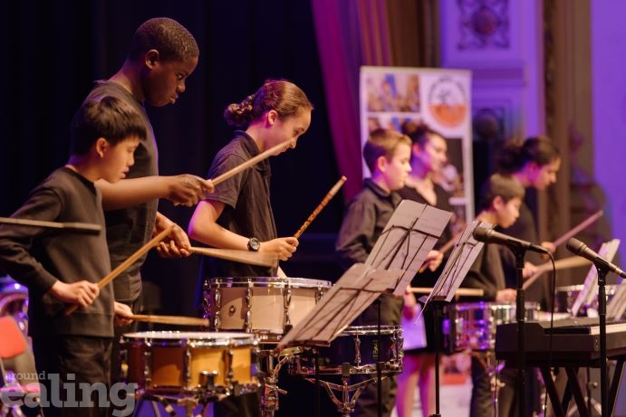 children playing percussion instruments