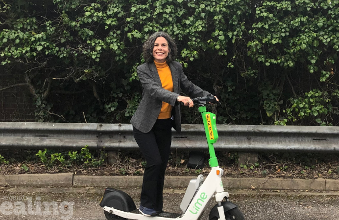 Councillor Deirdre Costigan on an electric e-scooter