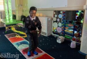 young boy in sensory room