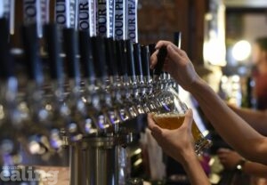 Pint of beer being pulled to illustrate licensing policy and impact on nighttime economy