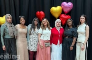 Group of nominees and attendees at awards event