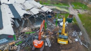 aerial view of 2 diggers starting the demolition of Gurnell Leisure Centre