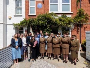Unveiling Odette Sansom's blue plaque with her family and dignitaries