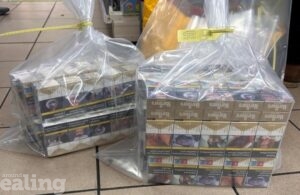 Cigarettes in clear bags on a floor