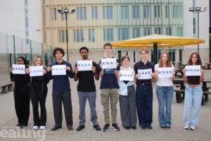 A line-up of students at Brentside High School with their A-level results