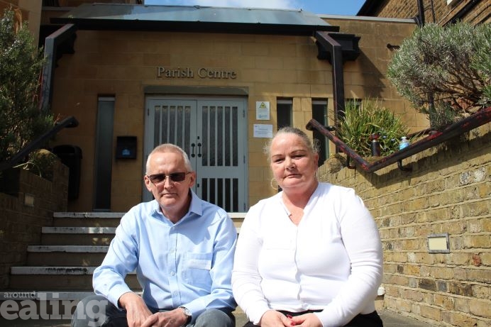 John Whitebrook and Mary Maloney sat outside a parish centre