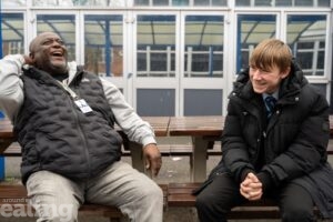 A mentor and mentee sharing some laughs