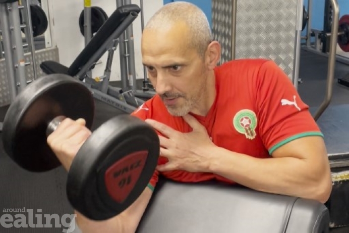 Mohamed, a personal trainer, working out in the gym