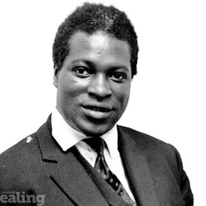 Smiling man, wearing suit and tie