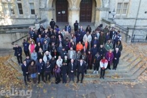 Care leavers and council staff gathered outside the town hall