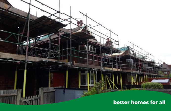 Row of houses with scaffolding