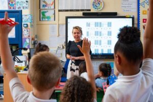 A teacher and pupils at Stanhope Primary School