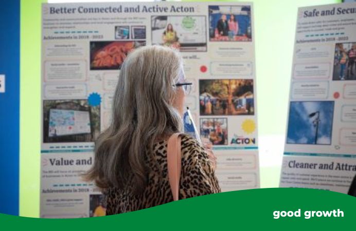 woman looking at exhibition/information boards