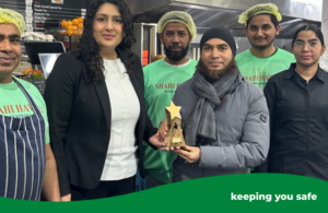 Councillor Kamaljit Nagpal with the team at Shahi Haweli restaurant. Owner holding an award