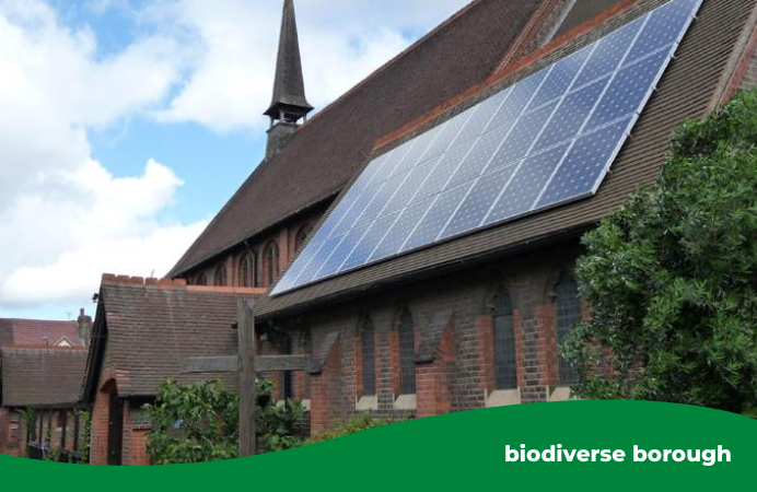A photo of St George's church in Southall with solar panels on the roof.