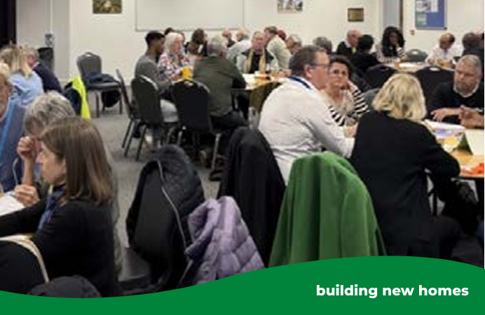 People sitting around tables talking