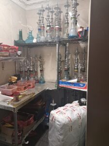 Shisha pipes and shisha in a storage room