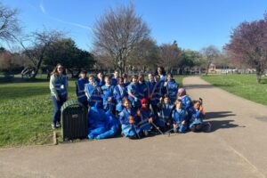staff and school pupils from Derwentwater Primary on an outdoor litter pick
