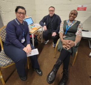 Three people sitting together