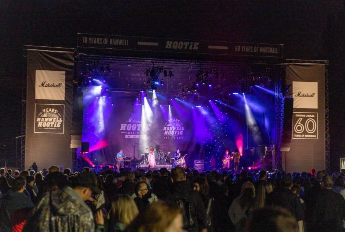 Multiple different colour light displays, with live music and an audience