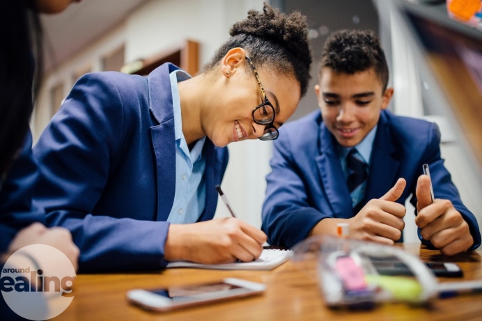 Students writing on some paper