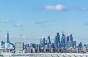 Builidngs of London in front of a blue sky