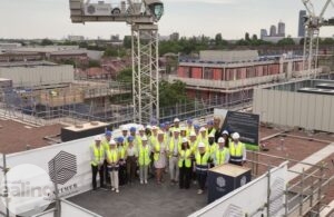 Group of people standing at the top of a building at Twyford Abbey